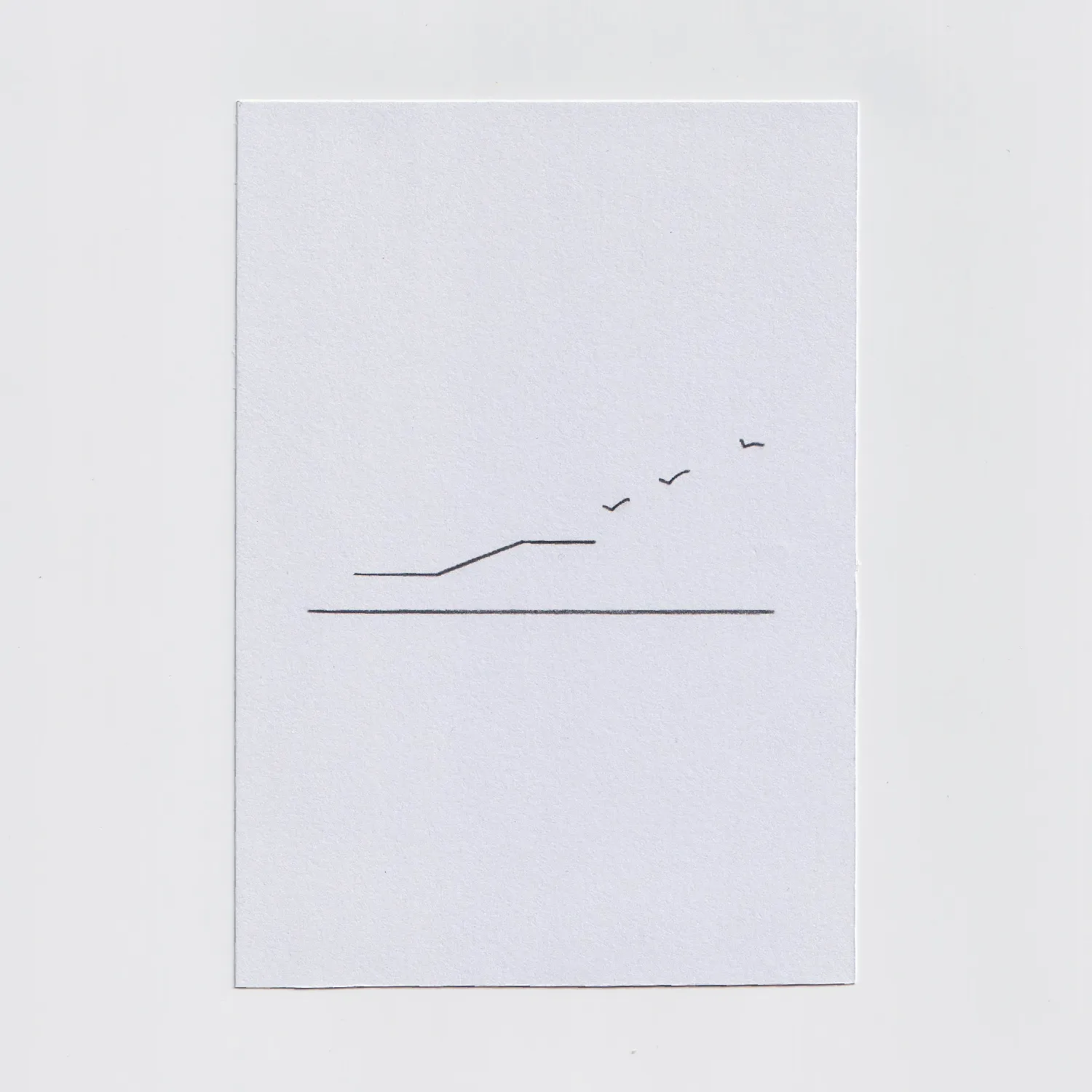 Minimal line drawing on paper.