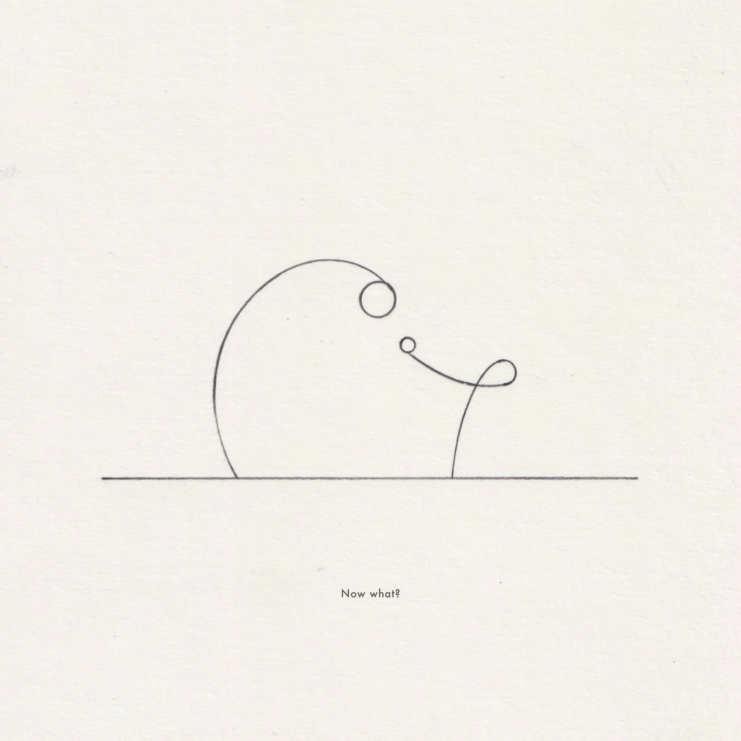 Ink line drawing on paper: a large looping circle and small circles above a horizontal line, captioned 'Now what?'